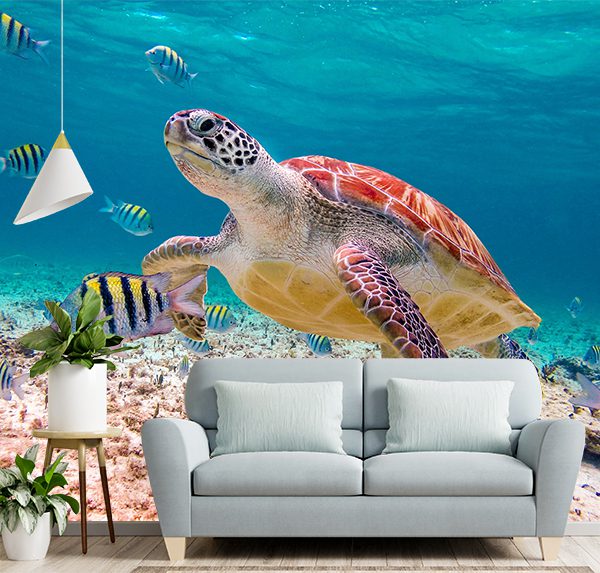 Majestic Sea Turtle Swimming Amidst Vibrant Coral Reefs